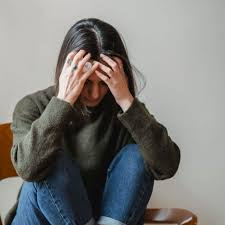 Woman taking a quiet moment while feeling overwhelmed